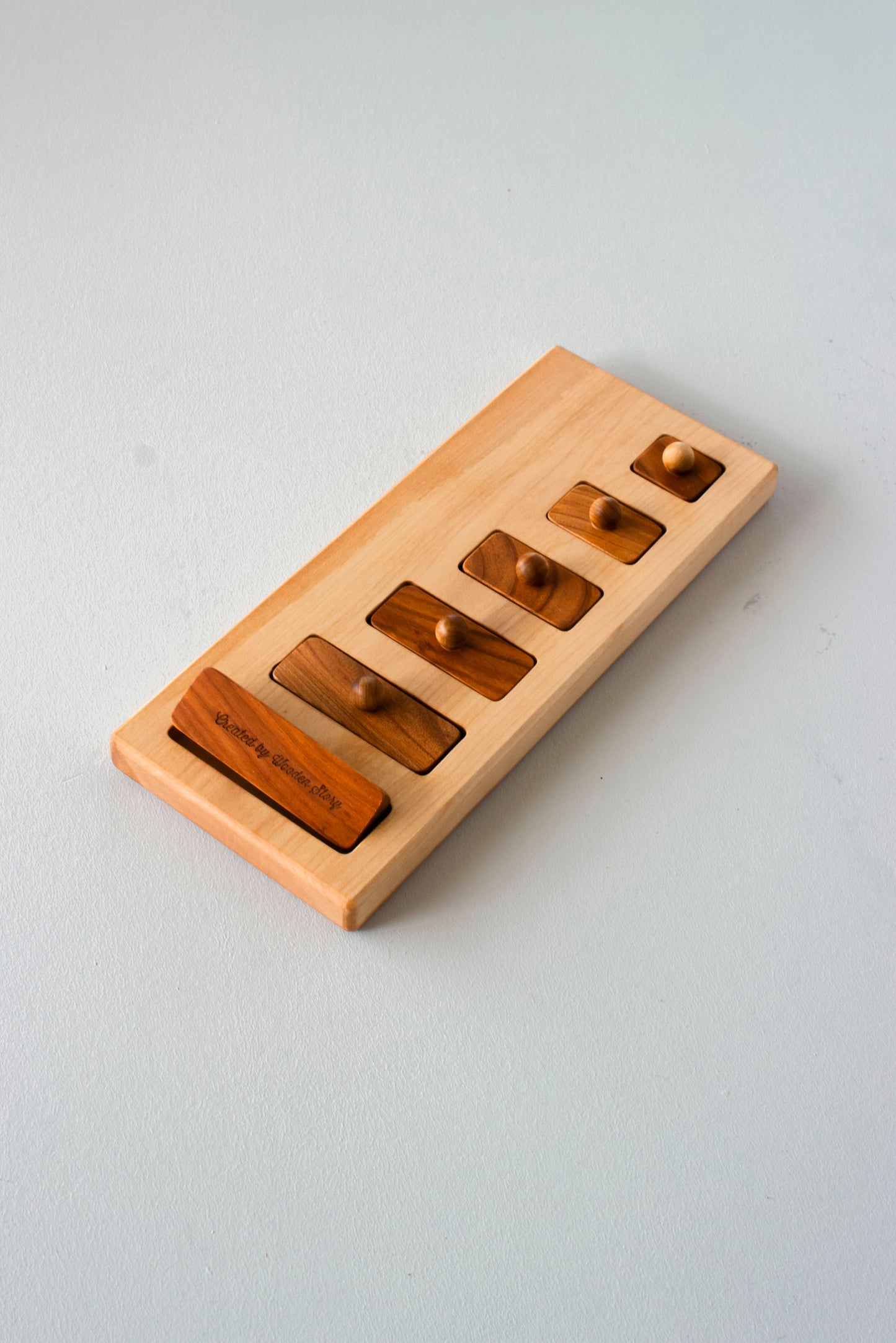 long-short knob puzzle - Montessori