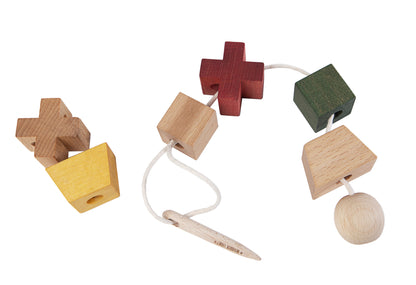 Wooden needle – for threading blocks